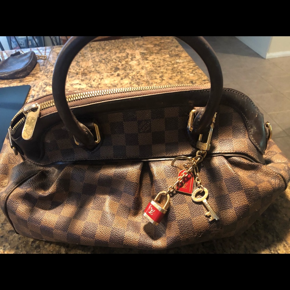 Louis Vuitton purse with 3 jewelry pieces
